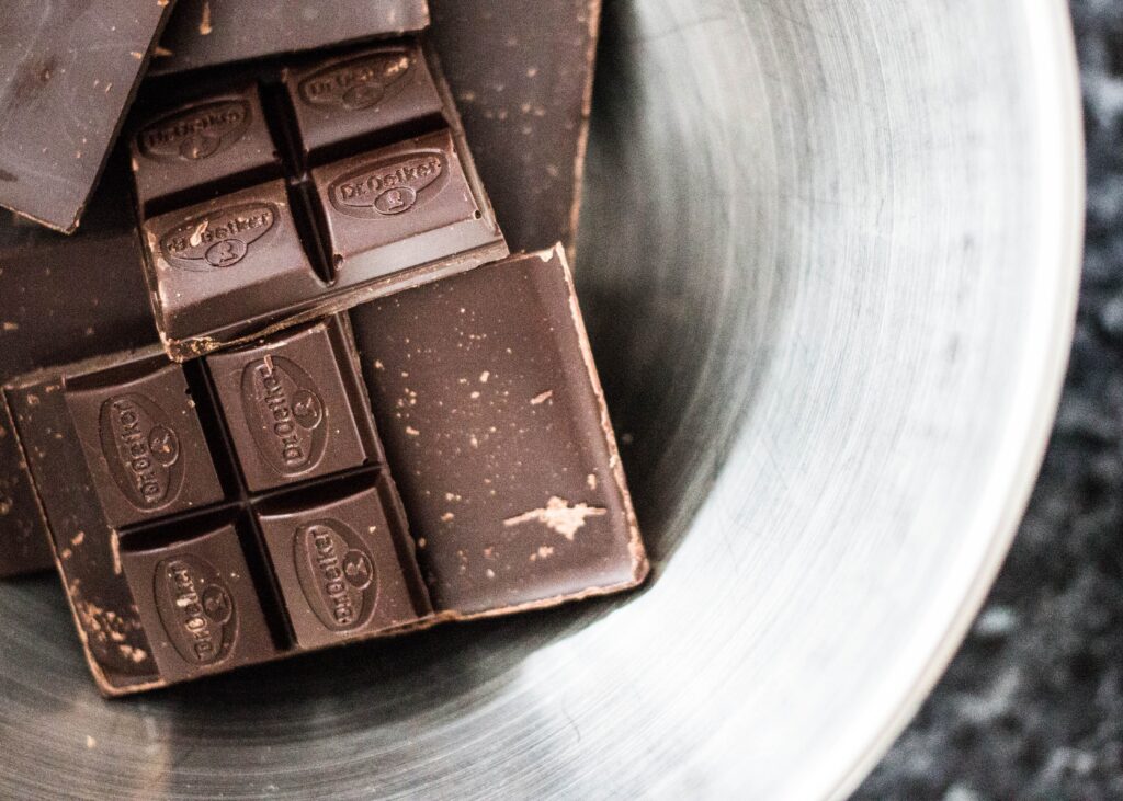 Chocolate bars in a dish. Dark chocolate relieves stress