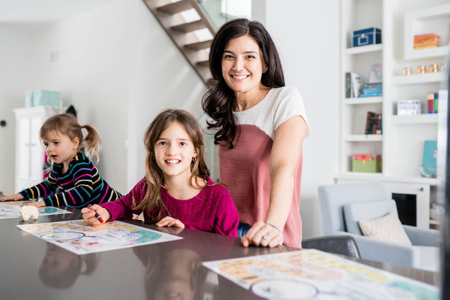 Danielle and her two daughters playing with the Curious Cookie Mat